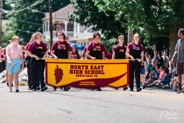 North East Highschool marching in the cherry fest parade