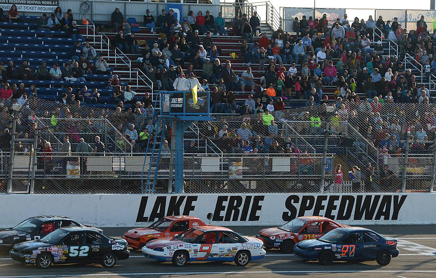 cars racing on the speedway at Lake Erie Speedway